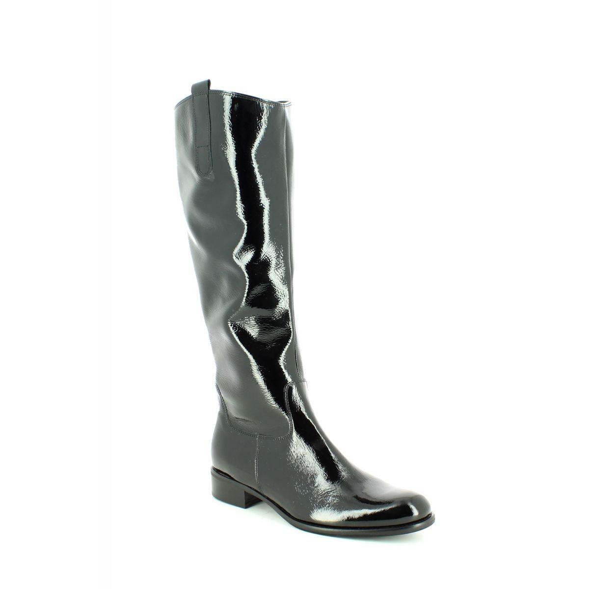 Black patent knee-high boots